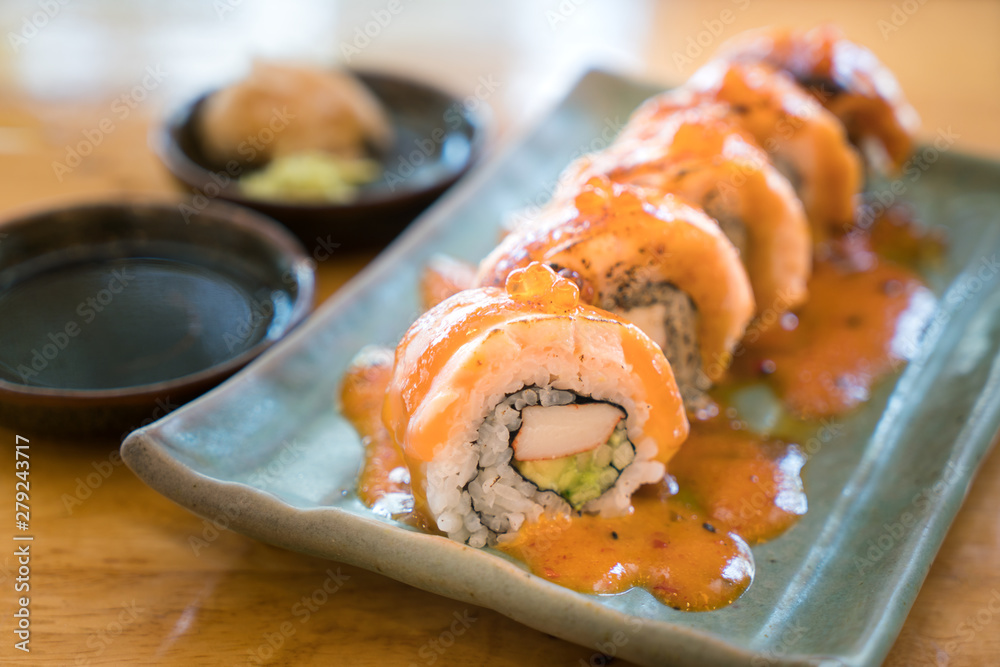 Philadelphia roll sushi with salmon, prawn, avocado, cream cheese. Sushi menu. Japanese food. Philadelphia roll sushi with salmon, prawn, avocado, cream cheese. Sushi menu. Japanese food.