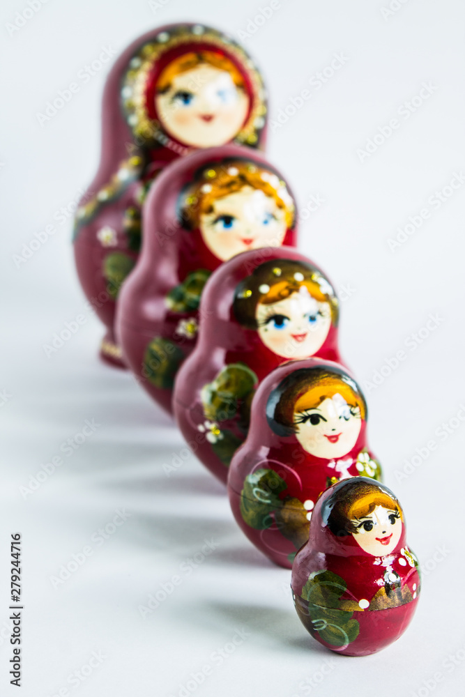 Russian wooden matryoshka on a white background