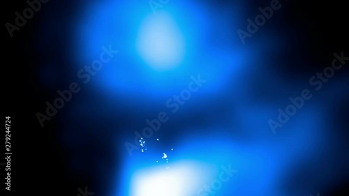 White sparks burst on white and cold blue and blurred shapes moving on a black background. Monochrome cold blue graphic animation for background or backdrop.