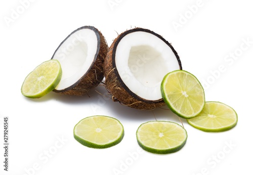 Cracked coconut with slices of lime