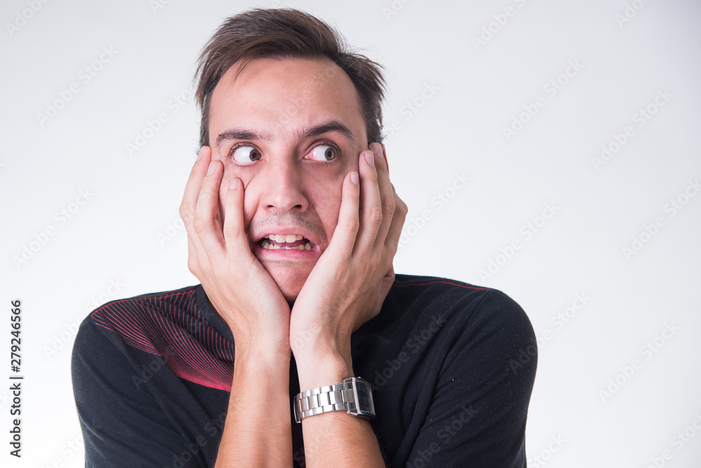 A shocked young guy in disbelief A shocked young guy in disbelief