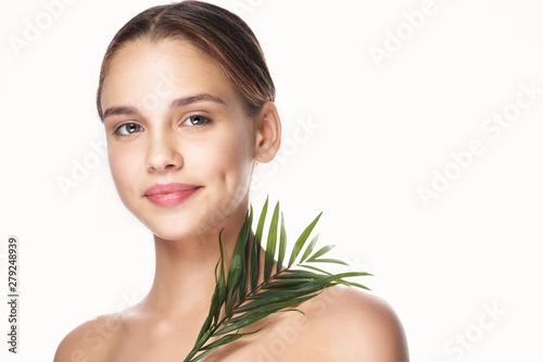 portrait of a young beautiful smiling woman with perfect skin