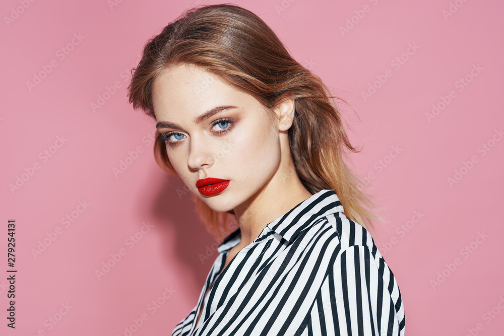 portrait of a young beautiful smiling woman with perfect skin looking at camera portrait of a young beautiful smiling woman with perfect skin looking at camera