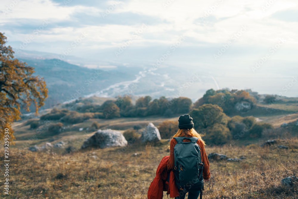 hiker on top of mountain in mountains hiker on top of mountain in mountains