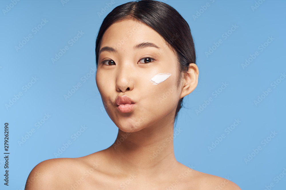 woman with cream on face woman with cream on face