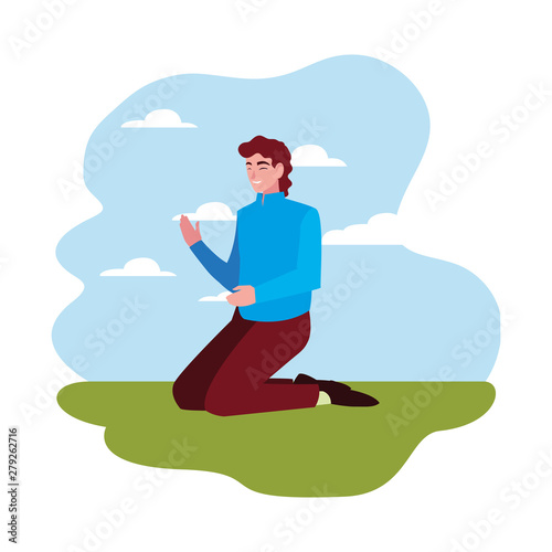 man on his knees outdoors background