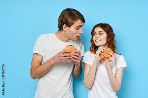 couple with hamburgers