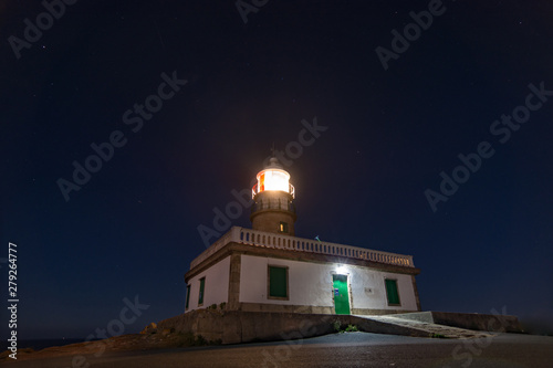 lighthouse at nightNight photography with full moon in Corrubedo lighthouse Galicia Spain