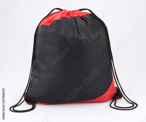 Black/red backpack isolated on white background