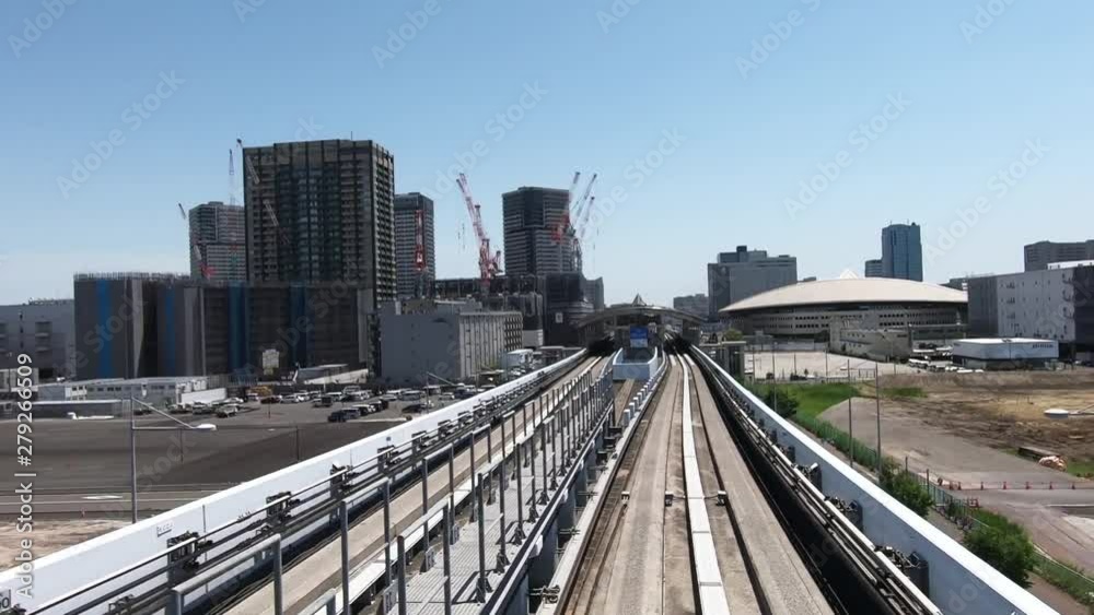Japanese railway car window. View during urban development Japanese railway car window. View during urban development