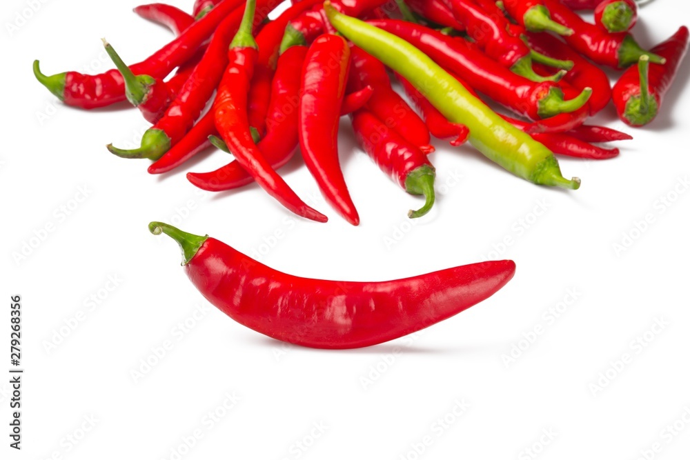 Hot red  and one yellow chili peppers