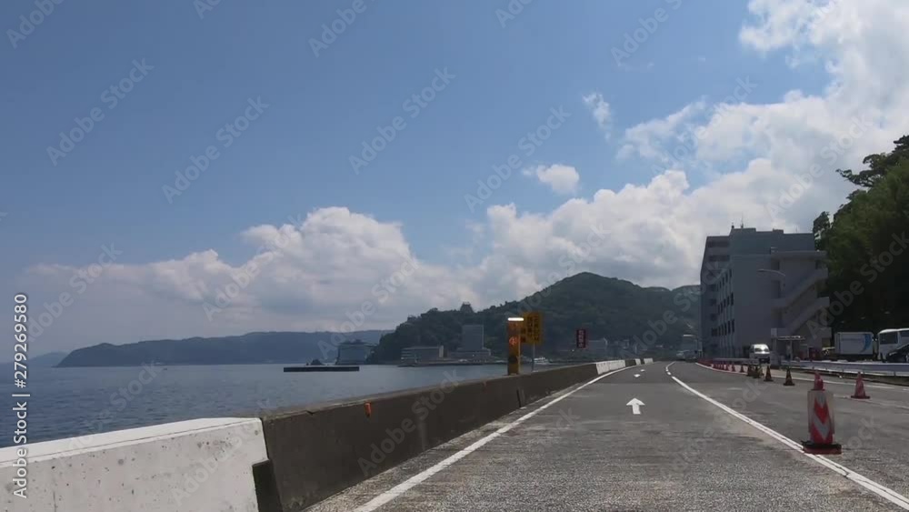 Driving picture. Tollgates by the sea