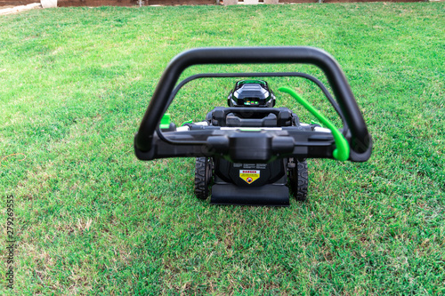 Battery powered 56 volt electric lawnmower for eco lawn care