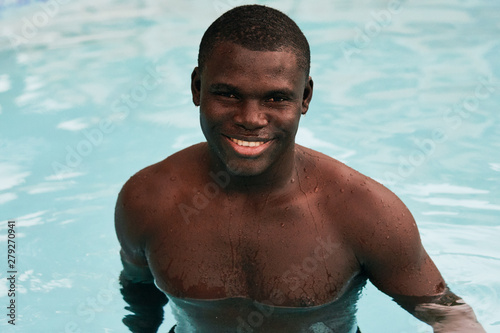 young man in swimming pool © SHOTPRIME STUDIO