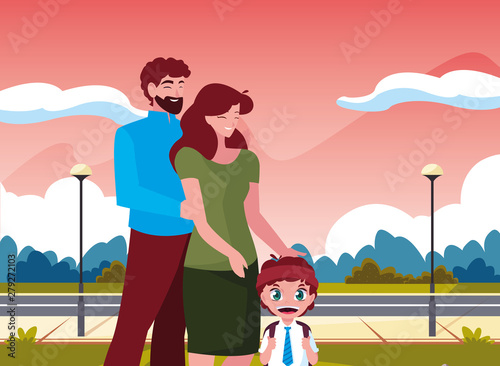 parents with school boy waiting in the street