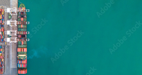 Container ship carrying container for import and export, business logistic and transportation by ship in open sea, Aerial view container ship with copy space.