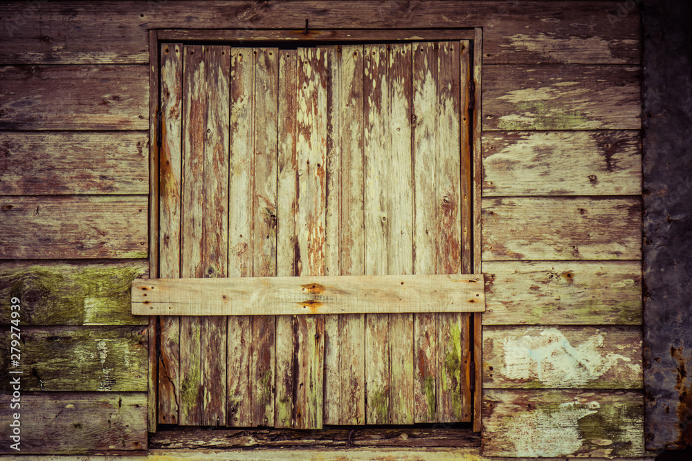 Closed window. nailed board in the wooden Window Closed window. nailed board in the wooden Window