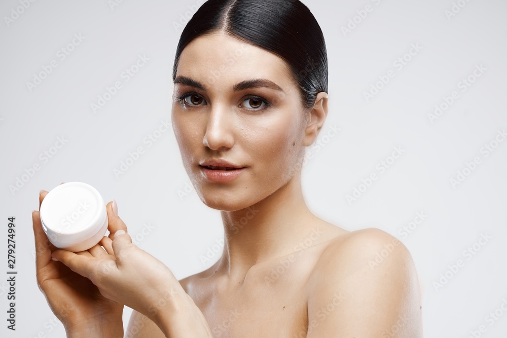 portrait of a young smiling woman with perfect skin portrait of a young smiling woman with perfect skin