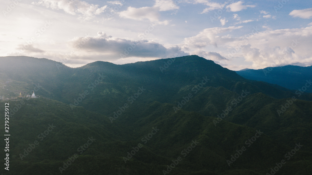 Aerial view of mountains and chewed roads on the mountain during sunset at Khao Kho Viewpoint, Phetchabun Province, Thailand