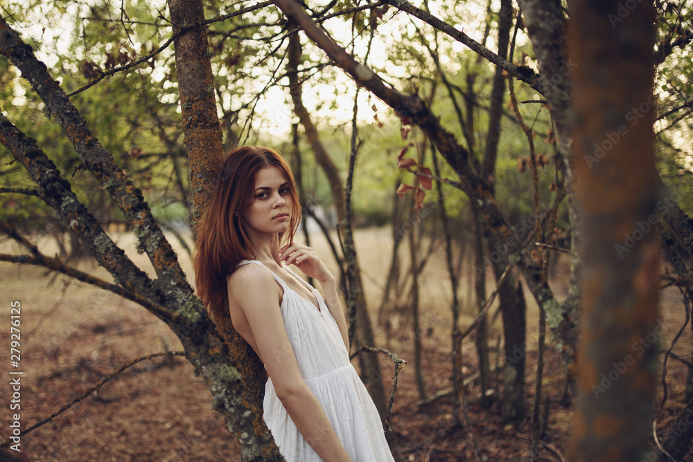 portrait of a young beautiful woman with perfect skin in forest portrait of a young beautiful woman with perfect skin in forest