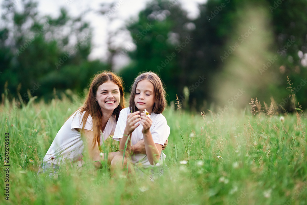 Fototapeta premium happy mother and daughter in the park