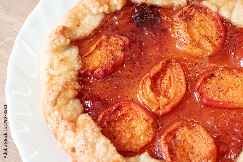 Apricot pie on kitchen table. Summer berry biscuit recipe. Apricot pie on kitchen table. Summer berry biscuit recipe.