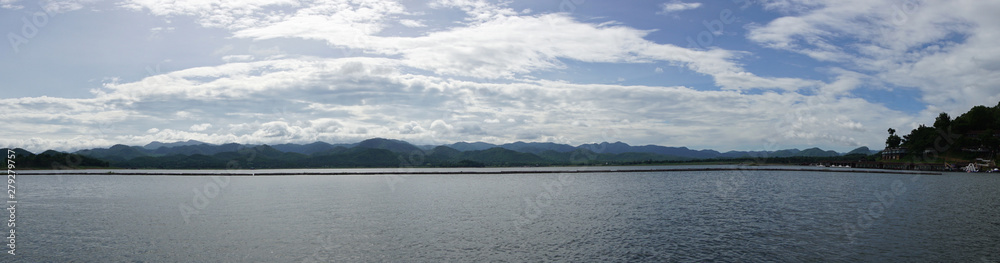 Panoramic view of the beautiful lake with blue sky at Srinakarin Dam in Kanchanaburi Province,