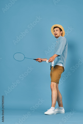 young man with tennis racket
