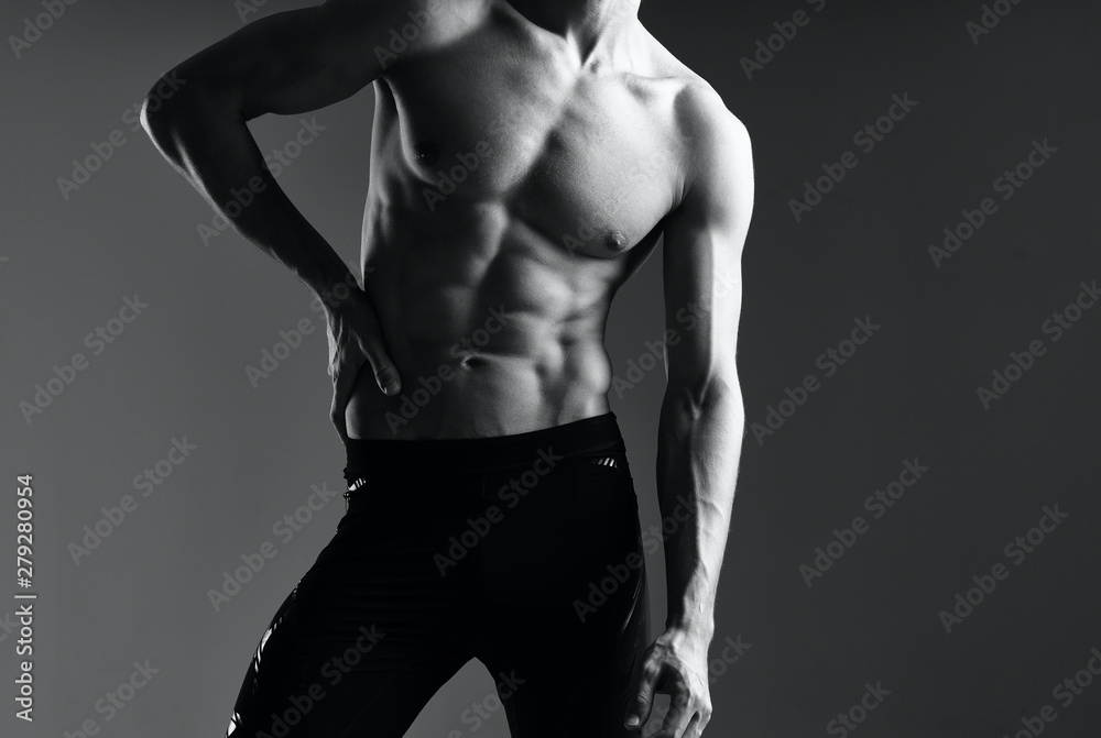 Fototapeta premium muscular man posing in studio