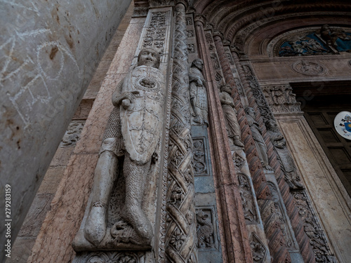 Cathedral of Verona, external Romanesque architecture with bestiaries carved in marble