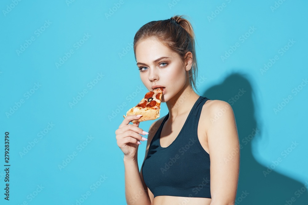 portrait of a young beautiful woman with pizza portrait of a young beautiful woman with pizza