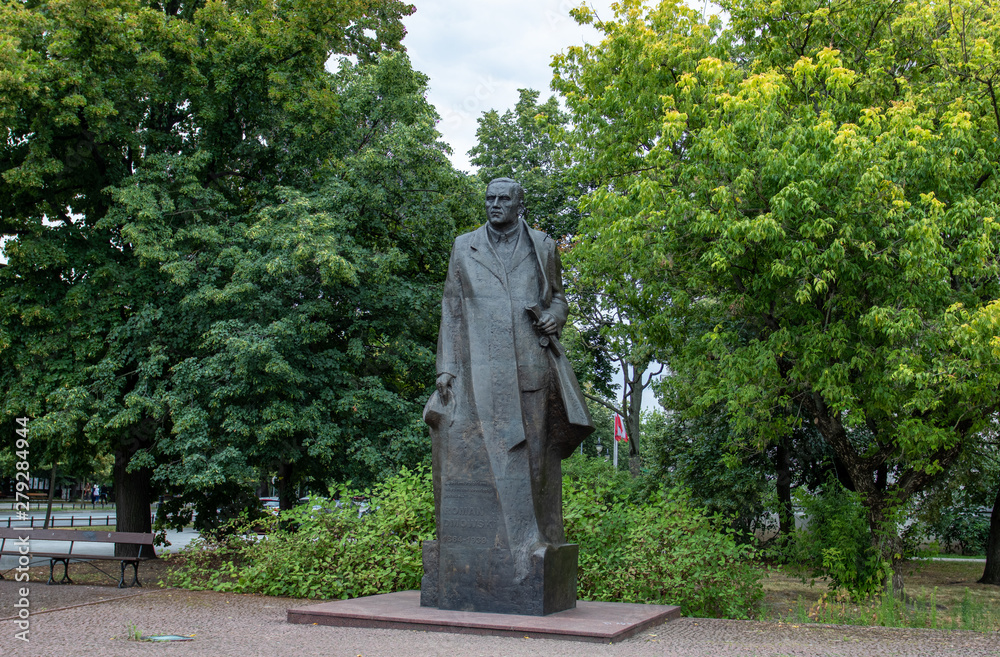 Monument to Roman Dmowski on the Szucha street. The statue holds a copy ...