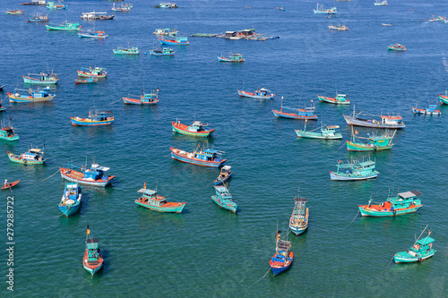 Sun world hon thom travelling above blue vietnam sea and boats in Vietnam, Phu Quoc 2019 photo