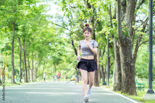 People are exercising at the park with blurry background