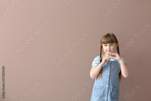 Cute deaf mute girl using s...