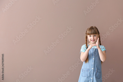 Cute deaf mute girl using s...