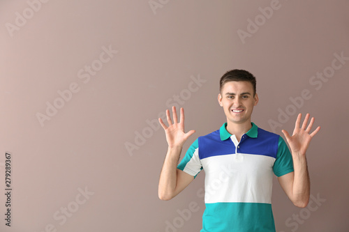 Young deaf mute man using s...