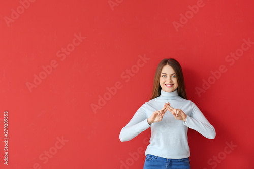 Young deaf mute woman using...