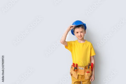 Cute little worker on white...