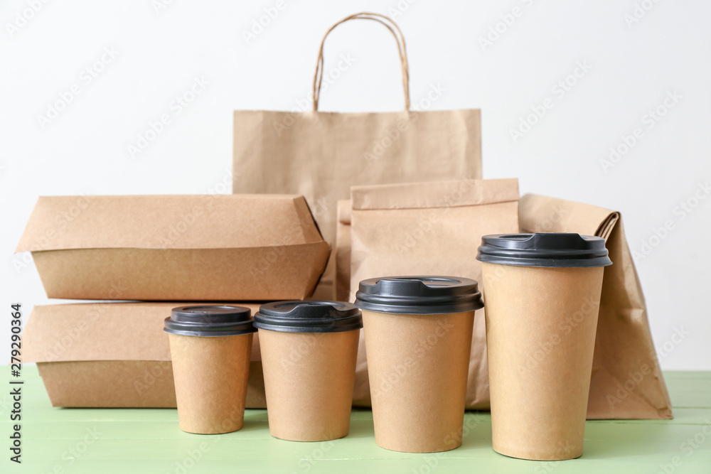 Assortment of food delivery containers on table Assortment of food delivery containers on table