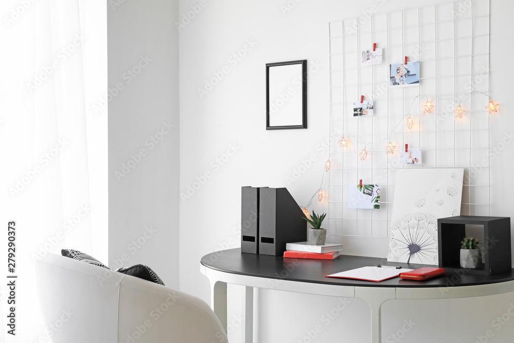 Workplace with mood board in modern room Workplace with mood board in modern room