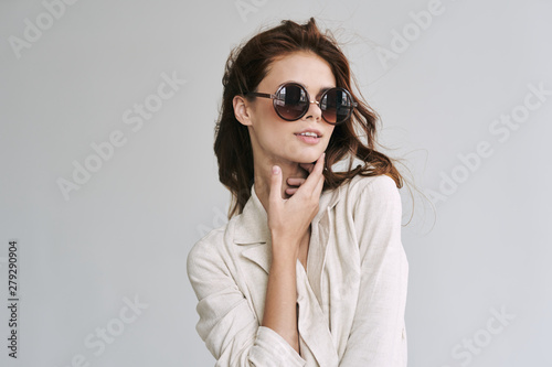 portrait of young woman with sunglasses © SHOTPRIME STUDIO