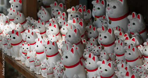 Gotokuji Shrine with lots of cat statues © leungchopan