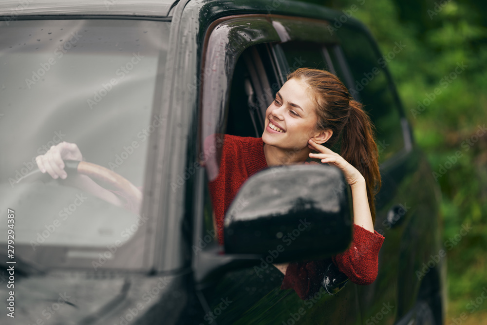 young woman in car young woman in car