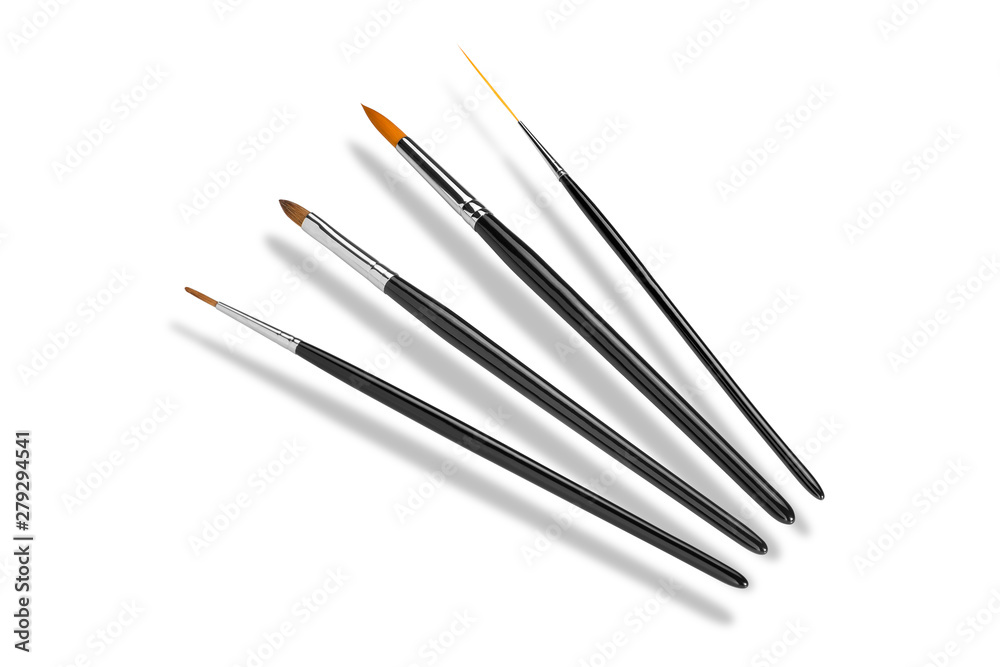 Set of cosmetic brushes, different forms. Isolated on white background. Top view. Cosmetics and beauty concept. Copy space Set of cosmetic brushes, different forms. Isolated on white background. Top view. Cosmetics and beauty concept. Copy space