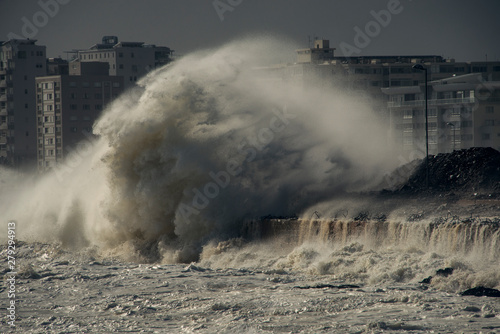 Fototapeta Naklejka Na Ścianę i Meble -  Storm wave impacting sea wall