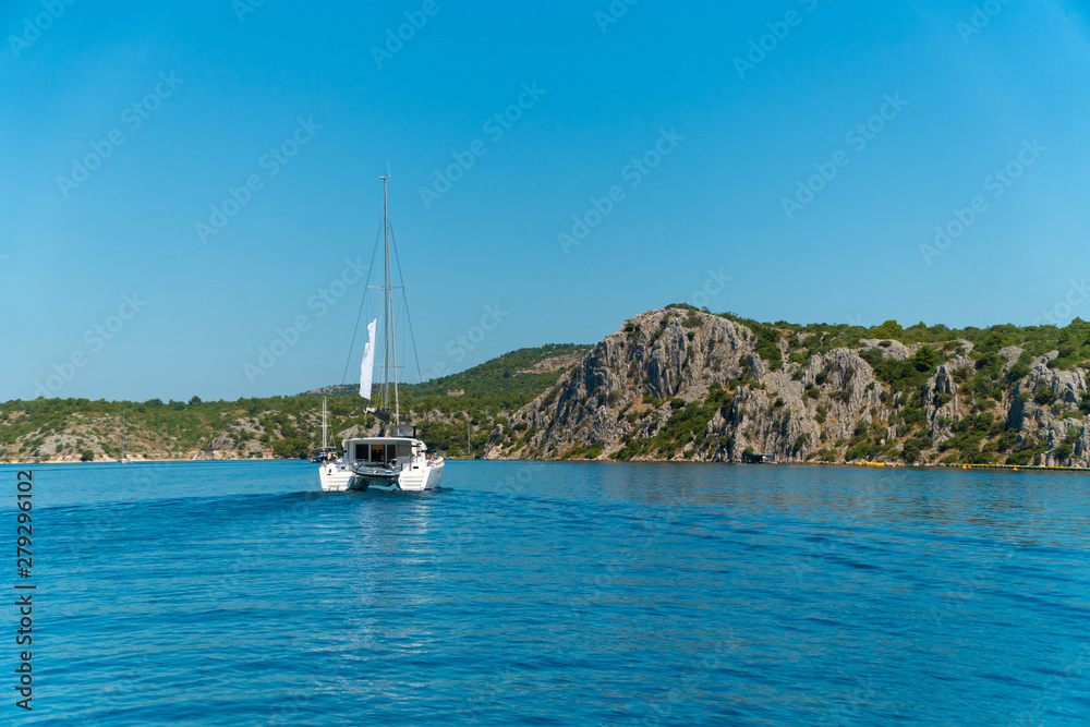 Catamaran sailing at sea in Croatia, Europe Catamaran sailing at sea in Croatia, Europe