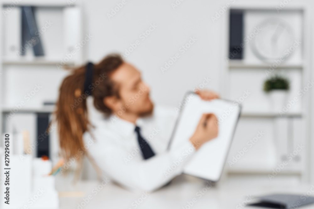doctor talking on phone at desk doctor talking on phone at desk
