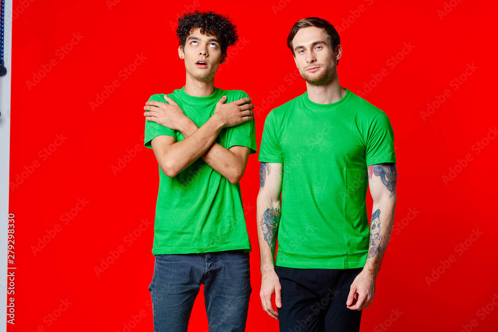 young friends in green shirts