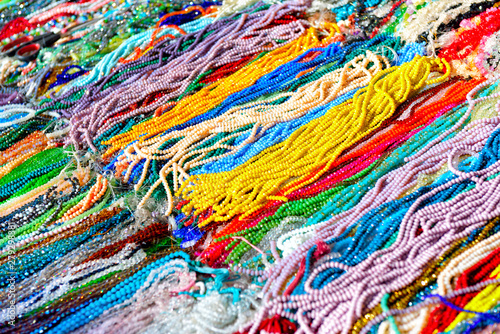 Multicolored beads, background. Jewelry, chains © Khorzhevska